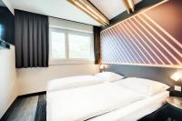 Posteľ alebo postele v izbe v ubytovaní B&B Hotel Salzburg-Nord