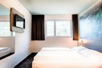 Posteľ alebo postele v izbe v ubytovaní B&B Hotel Salzburg-Nord