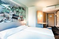 Posteľ alebo postele v izbe v ubytovaní B&B Hotel Salzburg-Nord