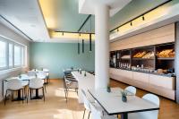 Reštaurácia alebo iné gastronomické zariadenie v ubytovaní B&B Hotel Salzburg-Nord