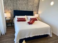 Posteľ alebo postele v izbe v ubytovaní Apartments Satis