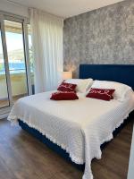 Posteľ alebo postele v izbe v ubytovaní Apartments Satis