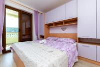 Postel nebo postele na pokoji v ubytování Apartments Mario
