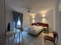Posteľ alebo postele v izbe v ubytovaní Hostal la Embajada