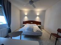 Posteľ alebo postele v izbe v ubytovaní Hostal la Embajada