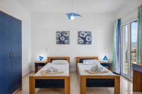 Posteľ alebo postele v izbe v ubytovaní Miranda Resort