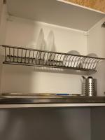 A kitchen or kitchenette at Colonel apartment 956