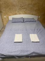 A bed or beds in a room at Colonel apartment 956