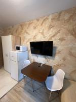 A kitchen or kitchenette at Colonel apartment 937