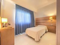 Postel nebo postele na pokoji v ubytování Hotel Ibiza Playa