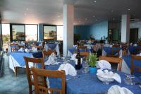 A restaurant or other place to eat at Hotel La Scogliera