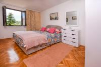 Postel nebo postele na pokoji v ubytování Apartments Juric