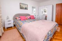 Postel nebo postele na pokoji v ubytování Apartments Juric