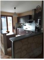 a kitchen with a counter top in a room at Maison en Provence in Salon-de-Provence