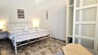 Posteľ alebo postele v izbe v ubytovaní Apartments Brajde