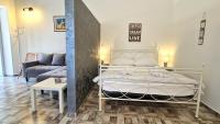 Posteľ alebo postele v izbe v ubytovaní Apartments Brajde