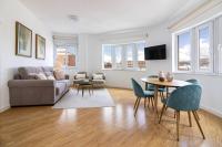 Televízia a/alebo spoločenská miestnosť v ubytovaní Atocha FreshApartments