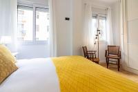 Posteľ alebo postele v izbe v ubytovaní Atocha FreshApartments