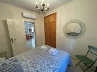 A bed or beds in a room at Green I