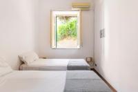 Posteľ alebo postele v izbe v ubytovaní mondello sea view beach apartment