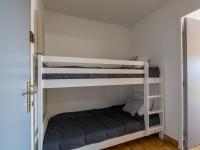 a couple of bunk beds in a room at Apartment La Palmeraie II-1 by Interhome in Sainte-Maxime