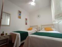 Posteľ alebo postele v izbe v ubytovaní La Joya Apartment