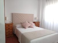 Posteľ alebo postele v izbe v ubytovaní La Joya Apartment
