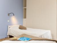 a bedroom with two beds with white sheets at Apartment Plasenn by Interhome in Saint Malo