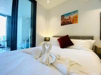 Postel nebo postele na pokoji v ubytování Edge Central Pattaya Vip Condo