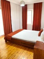 A bed or beds in a room at KAŞ MERKEZ İMREN APART 2
