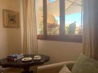 A seating area at Alghero Roof Garden