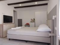 Posteľ alebo postele v izbe v ubytovaní Apartments Ciao Bella city centre with free parking