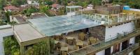 an overhead view of a building with chairs on the roof at Hotel Sico in Negombo