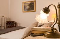 A bed or beds in a room at B&B Villa il Poggetto