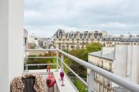 a balcony with a view of a city at Moxy Paris Bastille in Paris