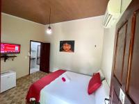 Cama ou camas em um quarto em Pousada e Restaurante Paraíso Natural
