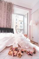 Łóżko lub łóżka w pokoju w obiekcie Royal Rooms - Elegante appartamento nel cuore di Roma