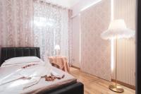 Łóżko lub łóżka w pokoju w obiekcie Royal Rooms - Elegante appartamento nel cuore di Roma