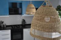 a wicker basket hanging in a kitchen at Serenity Apart in Antalya