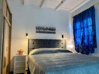 Postel nebo postele na pokoji v ubytování Kineta luxury House