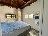 Postel nebo postele na pokoji v ubytování Kineta luxury House