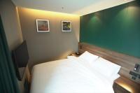 Sienna Ambassador Residenceにあるベッド
