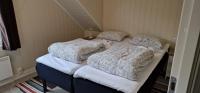 Postel nebo postele na pokoji v ubytování Pilan Lodge Lofoten