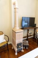 A television and/or entertainment centre at Domus Fontis Pescaia