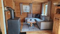 Posedenie v ubytovaní Gemütliches Ferienhaus mit Holzofen und Sauna