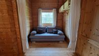 Posedenie v ubytovaní Gemütliches Ferienhaus mit Holzofen und Sauna