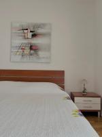 Posteľ alebo postele v izbe v ubytovaní Apartment Lola