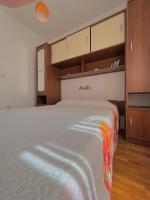 Posteľ alebo postele v izbe v ubytovaní Apartment Lola