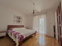 Posteľ alebo postele v izbe v ubytovaní Apartment Lola