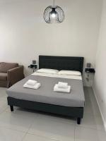 Postel nebo postele na pokoji v ubytování Art Atelier Apartments